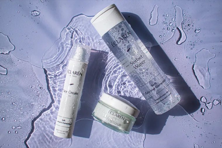 Éclarén: Face Cream, Sorbet Water and Face Scrub on a flooded lilac surface
